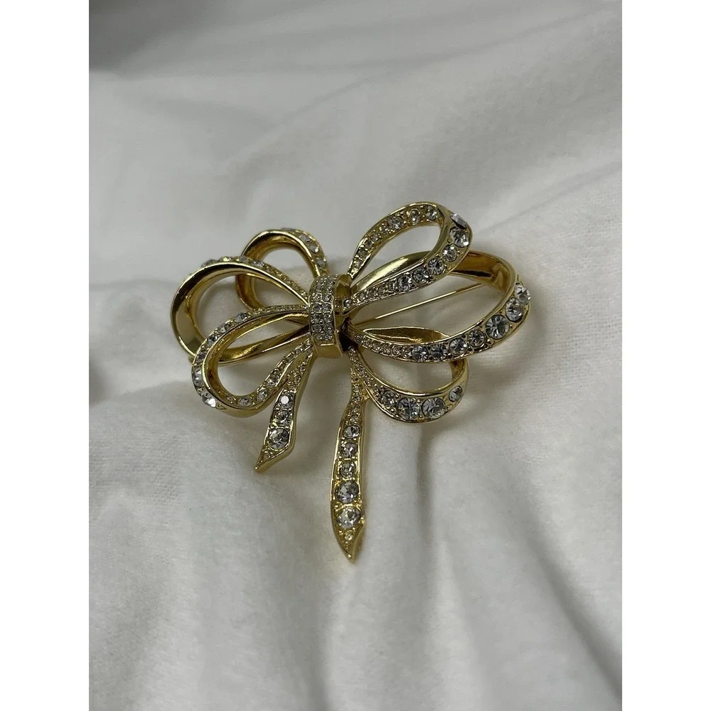 Vintage KJL For Avon Bow Pin Brooch Crystal Gold Tone Kenneth Jay Lane 2 3/4 In.